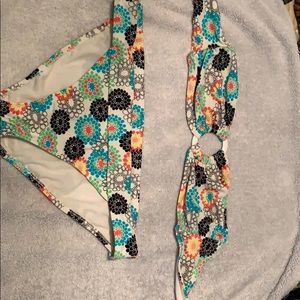 White and multi colored flower bikini